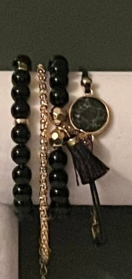 Black and Gold 4pc Bracelet's